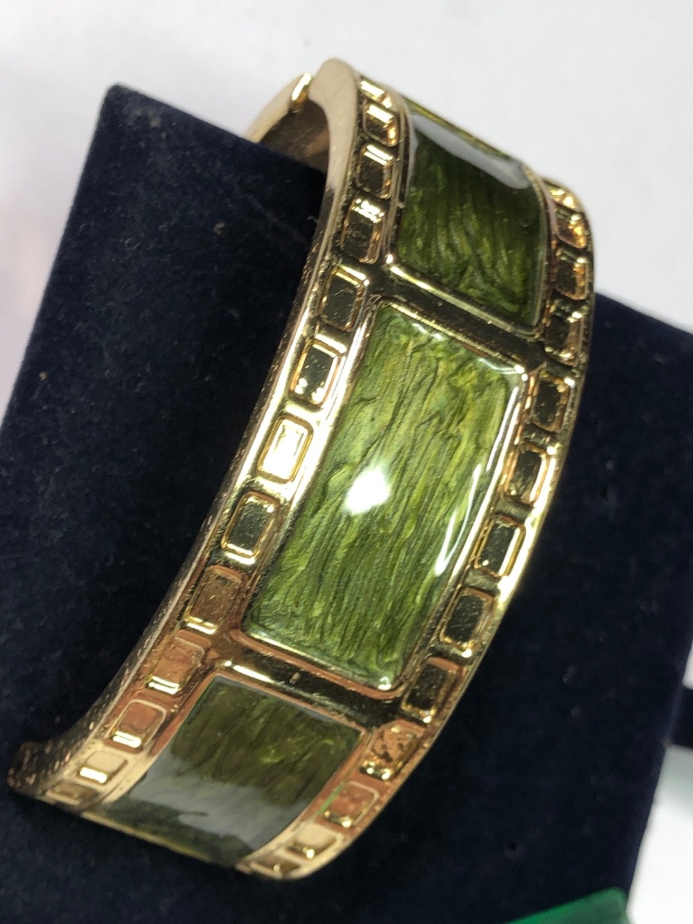 Green enamel gold tone bangle clamper bracelet
